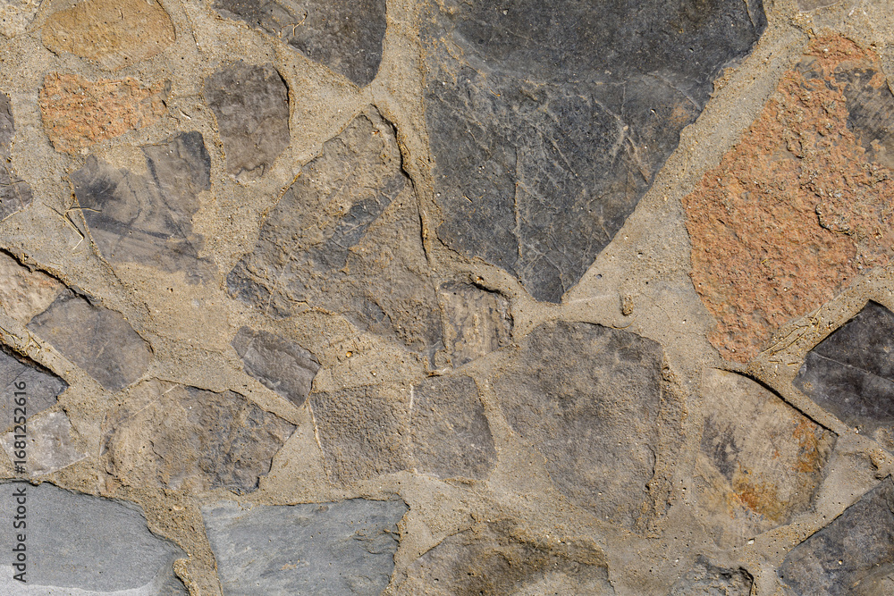 Aufkleber high-resolution image of a rustic stone wall texture. perfect for backgrounds and design projects.