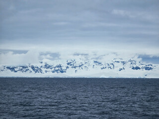 Antarctica with snow capped mountains