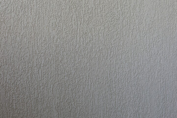 High-resolution image of a gray textured wall, perfect for backgrounds and design projects.  Download now!