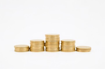 Coins arranged in multiple stacks representing prosperity
