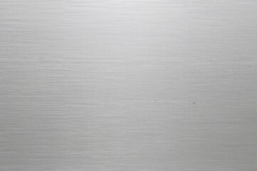 Metallic stainless steel texture as a background with a flat, polished surface