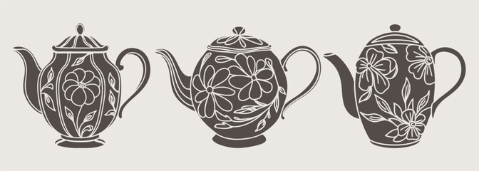 Set of teapot silhouettes with floral ornament. Hand drawn illustration.