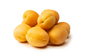 Ripe juicy orange apricots isolated on white background.