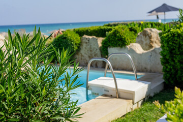 Escape to paradise with this stunning ocean view poolside scene. Relaxing resort vibes.
