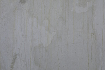 High-resolution image of a light gray concrete wall texture with stains and streaks. Perfect for backgrounds and design projects.