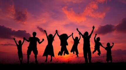Fototapeta premium A joyful moment captured as a group of people celebrates happiness against a vibrant sunset backdrop.