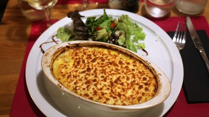 French cuisine - seafood gratine. French food photo.