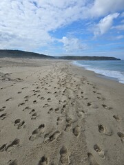 footprints on the beach