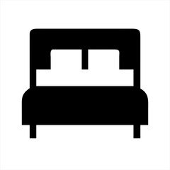 Simple black icon of a double bed with pillows