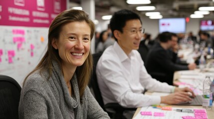 Team of tech startup professionals collaborating in a vibrant workspace during a brainstorming session