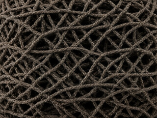 Braune F&auml;den im Verborgenen: Eine komplexe Struktur aus feinen Linien, die ein dichtes, gleichm&auml;&szlig;iges Netzwerk bilden. Symbol f&uuml;r Verbindung und Komplexit&auml;t, eingefasst in ruhiger Monochromie.