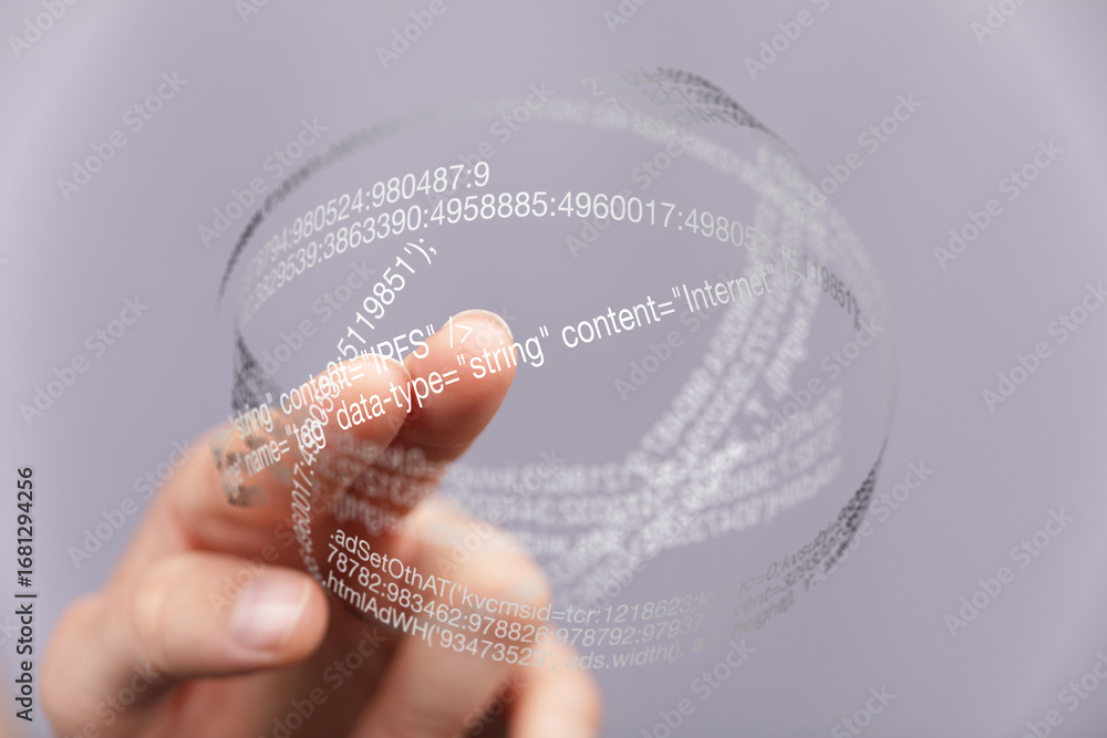 Poster close-up of finger interacting with a transparent sphere showing digital data and code.