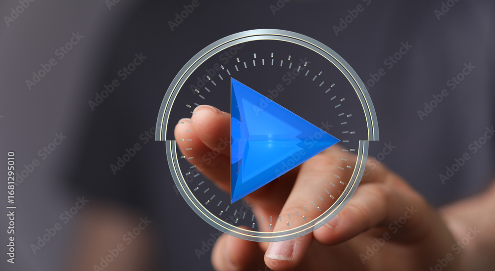 Poster abstract image of a hand interacting with a digital play button. perfect for technology, media, and 
