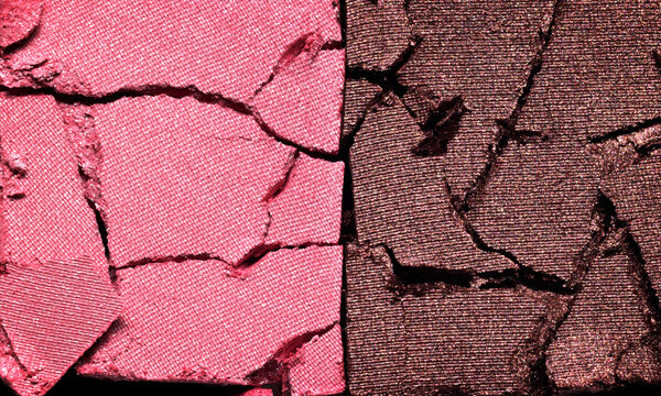 Pink and brown eyeshadow texture background. Cosmetic eye shadow product crumbled swatch