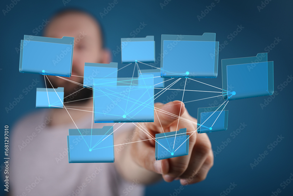 Poster person interacts with a network of digital files, showcasing data management and connectivity.