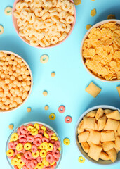 Different types of corn breakfasts on the table close-up. Vertical photo format