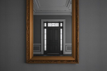 Fototapeta premium Side mirror reflecting a brightly lit doorway against a monochrome backdrop