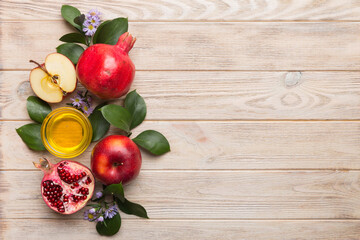 Flat lay composition with symbols jewish Rosh Hashanah holiday attributes on colored background, Rosh hashanah concept. New Year holiday Traditional. Top view with copy space
