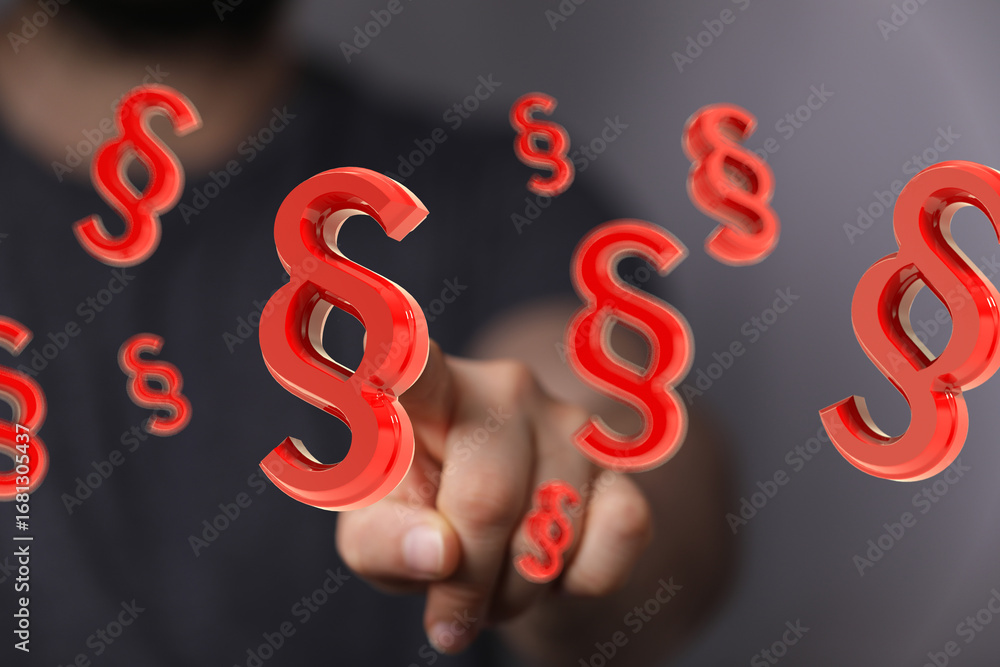 Poster abstract image of red paragraph symbols floating around a hand, representing legal concepts.