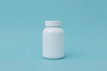 Isolated white plastic container for vitamins and medication on a plain blue surface.