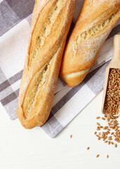 freshly baked bread on the table close-up. Vertical photo format