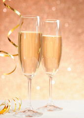 Christmas festive background with champagne in glasses. . Vertical photo format