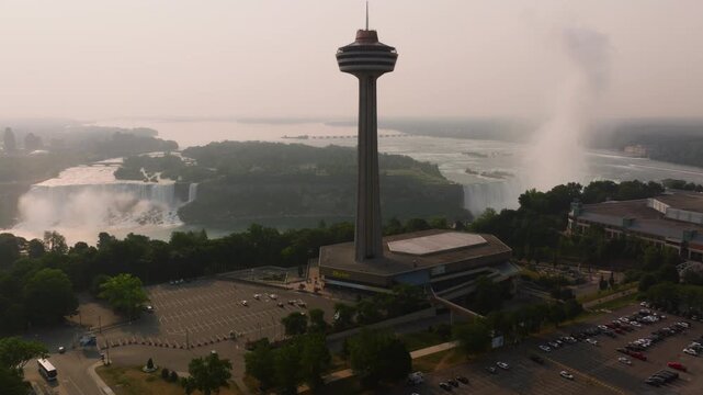 Aerial drone view of Skylon Tower and Niagara Falls skyline in Ontario, Canada