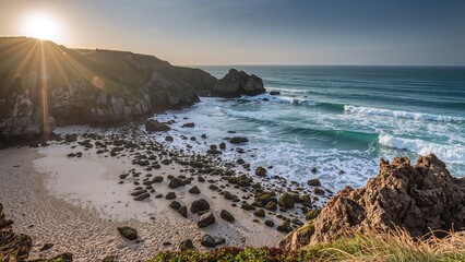 Coastal rocks by the ocean with sunlit waves and beach views