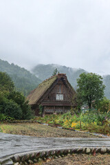 Shirakawa-go, Japan &ndash; 4 Oct 2024: Traditional Gassho-zukuri farmhouse, possibly the Wada House. Steep thatched roofs withstand heavy snow. UNESCO World Heritage site and important cultural property.
