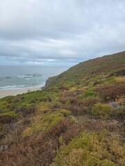 A mountain path in the fall along the ocean, Galicia, Spain 