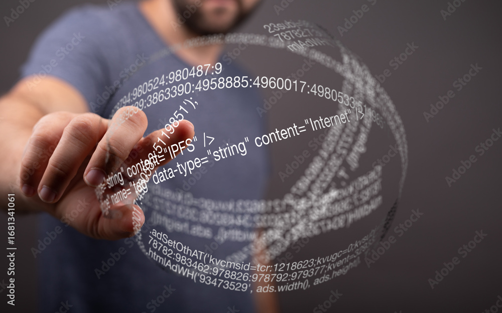 Poster close-up of a man interacting with a digital sphere of code, representing data and technology.