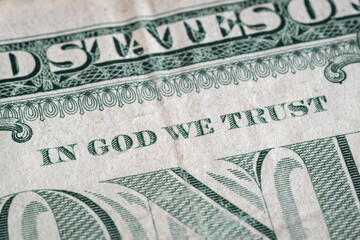 Words "In God We Trust" on American bill of one dollar, Close up detail from dollar banknote