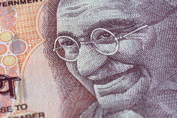 Portrait of Mahatma Gandhi on Indian bill, detail from banknote