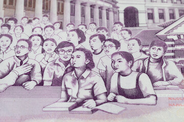 Detail from Singapore ringgit banknote close up, education system or teaching in class