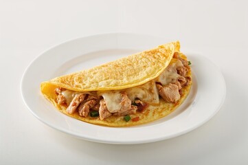 Omelette served on a plain white dish