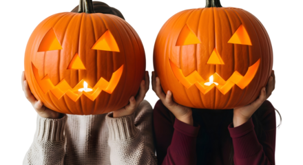Two people holding carved pumpkins for Halloween celebration against a white background