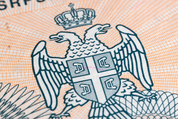 Serbian coat of arms on dinar banknote from Bosnia and Herzegovina, double headed eagle and shield with cross and four letter s