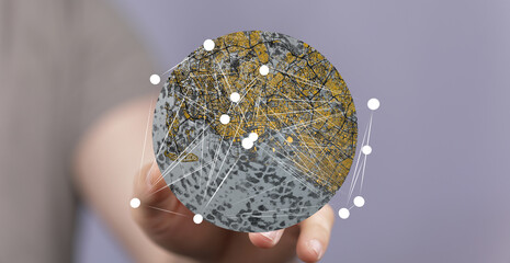 A hand holds a digital globe, showcasing interconnected nodes. Represents global network, data flow, connectivity.