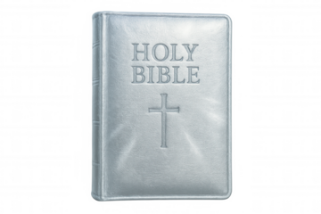 Silver holy bible with embossed cross isolated on transparent background, perfect for religious or spiritual themes