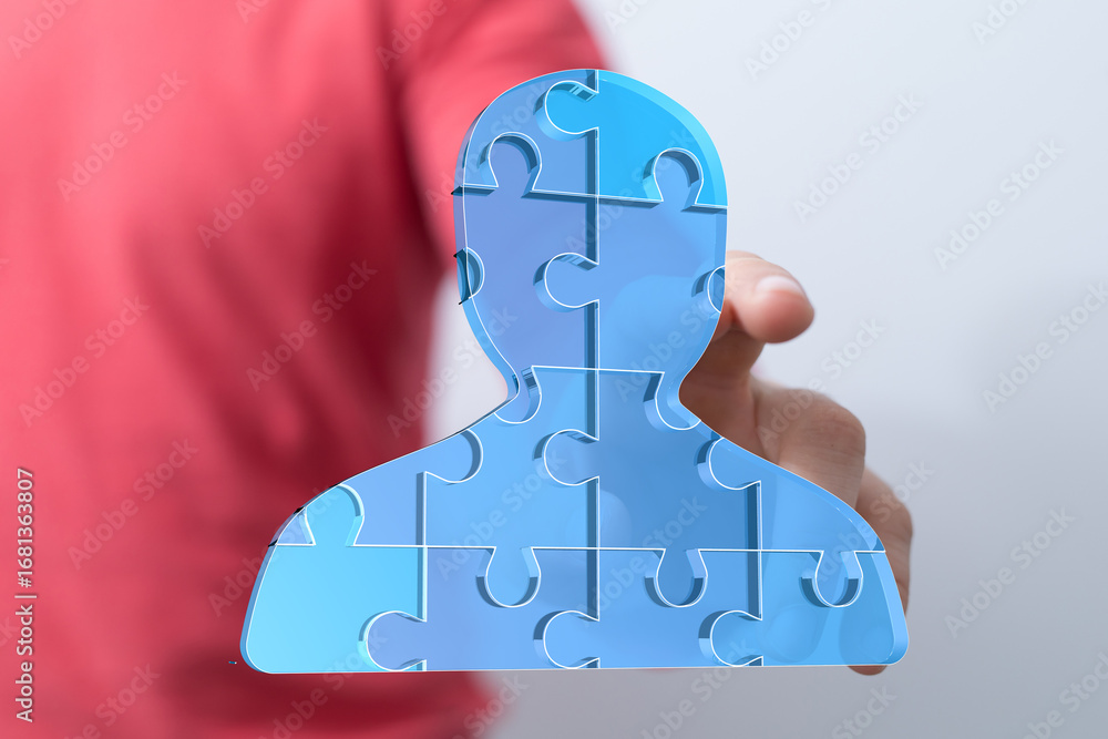 Poster abstract image of a person formed by puzzle pieces. ideal for teamwork, collaboration, and connectio