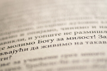 Open book close up, paragraph and margin on page
