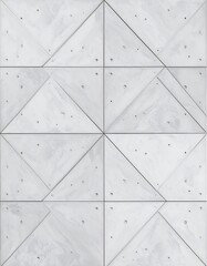 Obraz premium Geometric pattern of light gray concrete triangles creates a modern architectural facade.