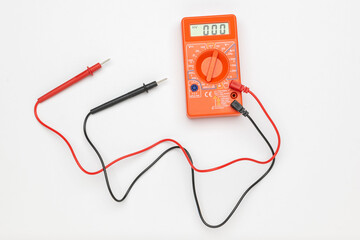 Digital Multimeter with Probes on White Background for Electrical Testing and Measurement