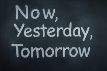 Obraz premium Time Concept Depicted with Yesterday, Now, and Tomorrow on Blackboard