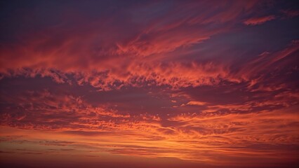 Fototapeta premium Intense scarlet, tangerine, and mauve cloudscape