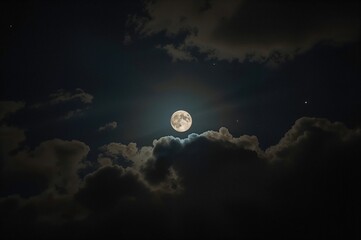 Stunning nighttime scene featuring a glowing full moon partially covered by clouds