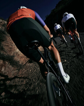 Cyclists ride on a cycling track. Mountain bike marathons. Sports competitions and road cycling.
