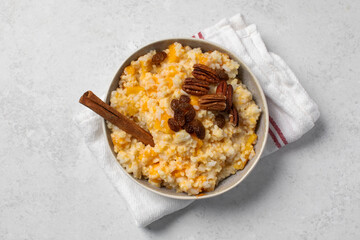 Rice millet porridge with pumpkin and cinnamon. Healthy breakfast
