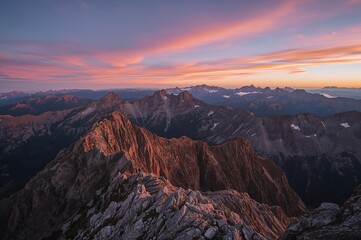 Naklejka premium View a mountain landscape at sunset during a hiking adventure