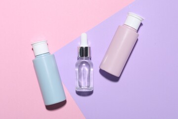 Cosmetic products on color background, flat lay. Mockup for design